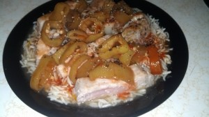 Poured over Pork tenderloin and rice